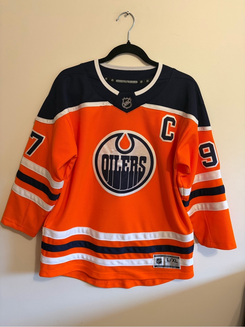 NHL- L/XL Edmonton Oilers home jersey # 97 Captain Connor McDavid.